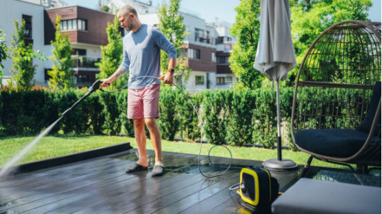 Electric Pressure Washer cleaning a patio before a party