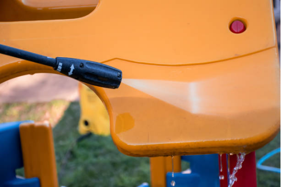 playground rubber mat cleaning with electric pressure washer